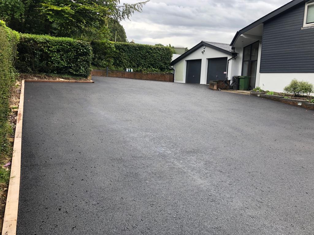 This is a photo of a asphalt driveway which is in the process of being installed by Warwick Asphalt & Bitumen Surfacing